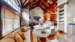 Gorgeous wood beams and vaulted ceilings with stone accents 